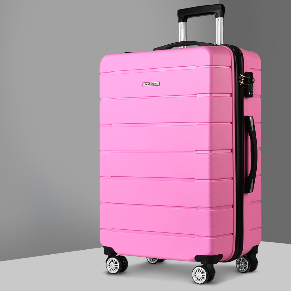 pink suitcases on wheels